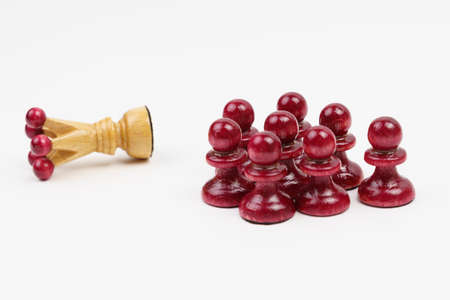 Business and politics concept. Chess, the king is defeated by pawns.の写真素材