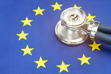 Medicine and economics concept. Stethoscope on the flag of the European Union