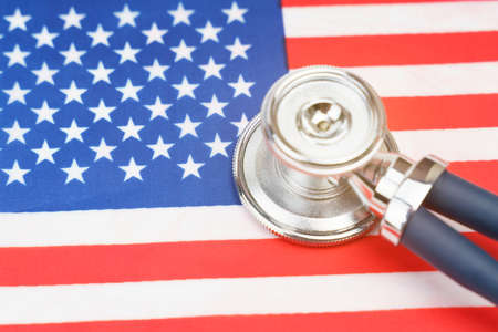 Medicine and economics concept. USA flag stethoscope.の写真素材
