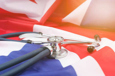 Stethoscope on the USA flag. Medicine and health concept. Side viewの写真素材