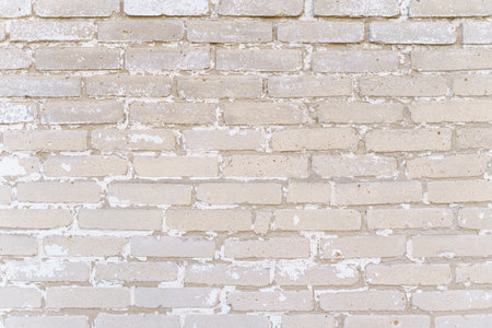 Texture. Brick wall texture with faded white paint.