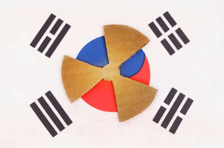 The concept of industry and radiation. The flag of South Korea has a symbol of radioactivity.の写真素材