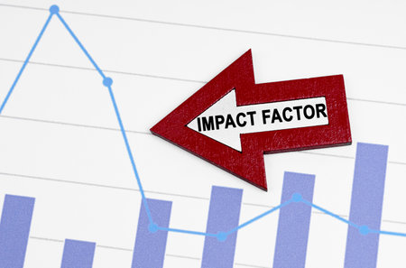 business concept. On the reporting chart there is an arrow with the inscription - IMPACT FACTORの写真素材