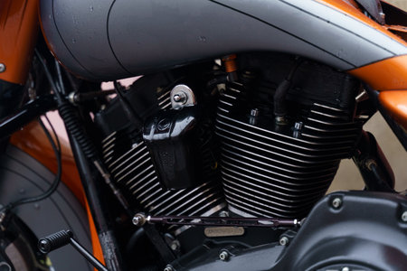 Shiny black motorcycle engine and gearbox block. close-up.
