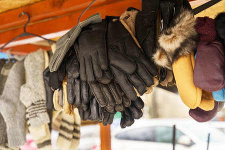 Market stall with leather gloves and mittens. close-up.の写真素材
