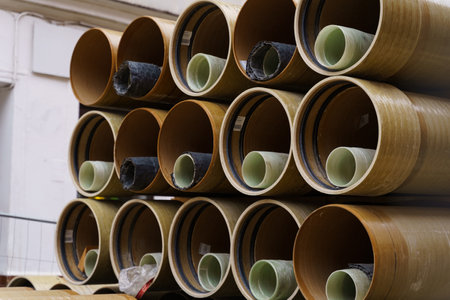 Close-up of new pipelines of different diameters on a city street. Communications