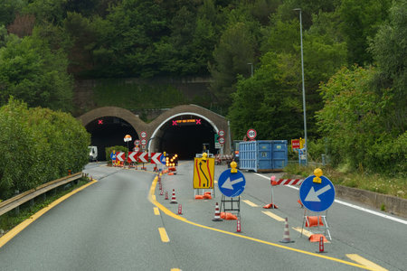 Tunnel repair. Organization of traffic. Road signs and markings indicating the order of movement...