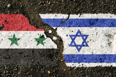On the pavement are images of the flags of Israel and Syria, as a symbol of confrontation....