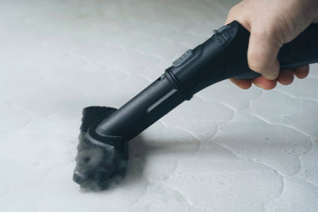Cleaning and disinfection of the mattress in the bedroom with hot steam. Professional cleaning...