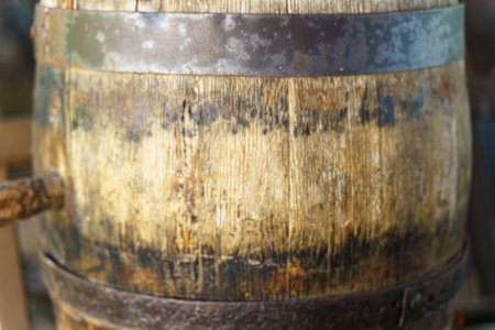 A detailed view of a wooden barrel placed on a table.の写真素材