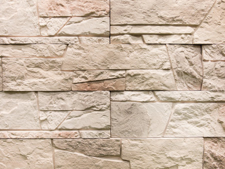 Warm hues of decorative tiles create an inviting atmosphere, showcasing textures and patterns. These finishing materials add character to walls, ideal for contemporary and rustic designs.の写真素材