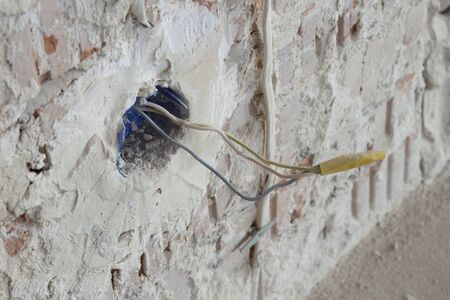 close-up of a three-phase electrical cable in a junction box.の写真素材