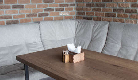 wooden brown box with a napkin is on the table