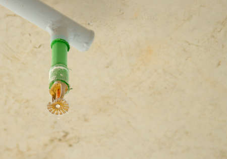 Fire fighting equipment, sprinkler on white ceiling background.Automatic head fire sprinkler extinguisher selected focus on sprinkler.Fire fighter safety concept.copyspace for textの写真素材