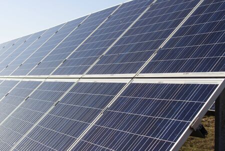 solar panels stand in the open. Generation of electricity from alternative sources