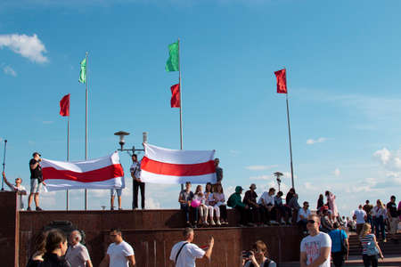 Mogilev, Belarus - August 16, 2020: People at the rally hold flags in the square. Peaceful protest against the 2020 presidential elections in Belarusのeditorial素材