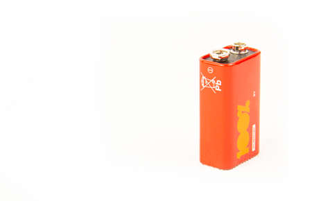 red battery on a white background with the inscription 100 .copyspace for text.