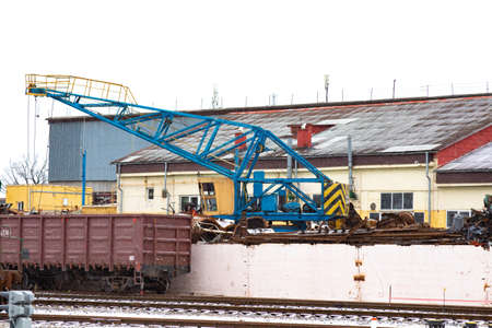 Scrap metal loading, train carrying industrial waste scrap. Recycling conceptの写真素材