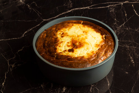 Cottage cheese casserole in a baking dish close-up.