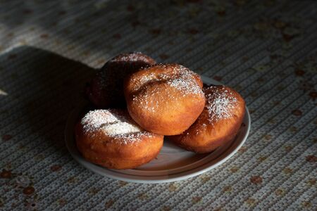 Traditional tasty homemade donuts in the vintage kitchen