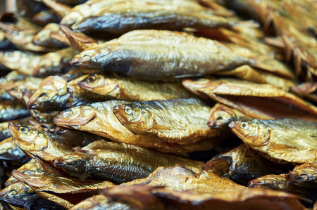 A lot of dried fish on the counter of the storeの写真素材