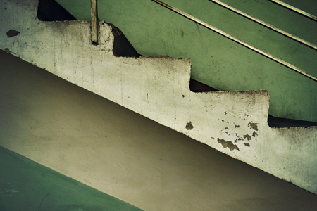 Dirty shabby staircase in old soviet buildingの写真素材