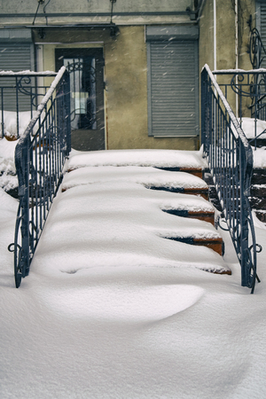 Staircase covered with snow after a great snow storm in Moscow in February 2018の写真素材