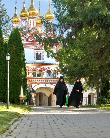 Volokolamsk oblast,Russia - August 14,2018. Nuns in the Joseph-Volotsky monastery in Russia in summer.のeditorial素材