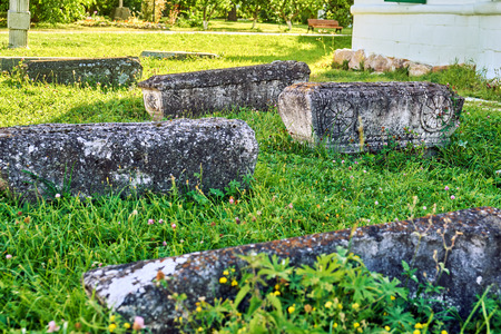Ancient medieval tombstones in the russian Joseph-Volotsky monastery in summerの写真素材