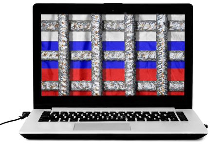 Laptop with crossed prison grate and a russian flag on the screen isolated on white background. Illustration of the law about disconnecting the Russian Internet from the world wide webの写真素材