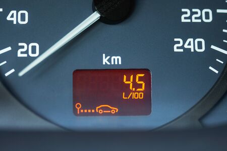 Low fuel consumption showed by the car on-board computer on the dashboard