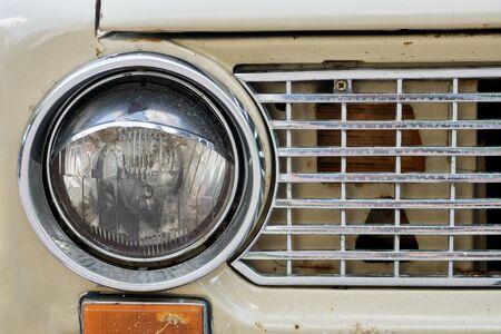 Headlight of old russian car zhuguli lada of the first model close upの写真素材