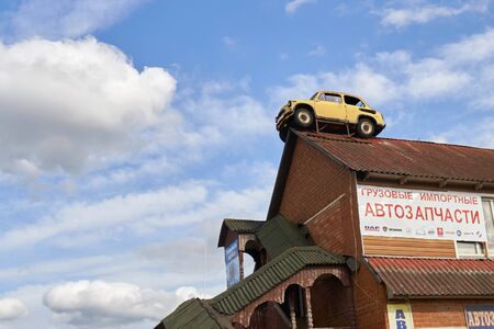 Moscow region, Russia - July 15, 2019: Vintage soviet car on a roof of a garageのeditorial素材