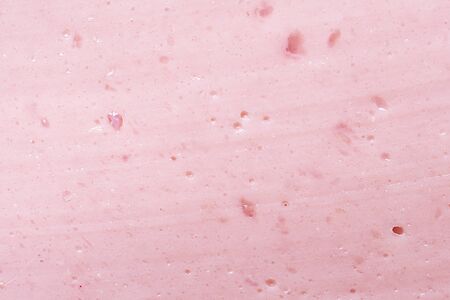 Texture of a slice of a tasty boiled sausage macroの写真素材