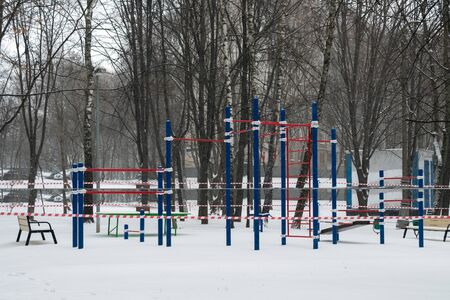 Closed sports ground blocked by a barrier tape during a quarantine in Moscow