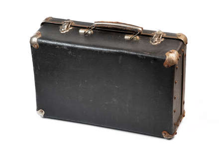 Old closed suitcase isolated on the white backgroundの写真素材