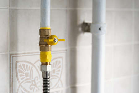 Gas valve on the gas pipe on the kitchenの写真素材