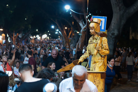 Rehovot, israel-July 7, 2022. Exhibition of living statues on the street at nightのeditorial素材