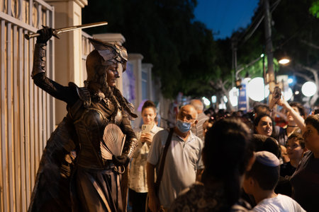 Rehovot, israel-July 7, 2022. Exhibition of living statues on the street at night