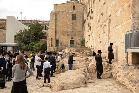 Hebron, West bank Israel-October 03, 2023:Religious orthodox Jews praying near the wall of the Cave of the Patriarchsのeditorial素材
