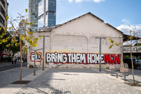Tel Aviv, Israel - March 15, 2024. Bring Them Home graffiti on the wallのeditorial素材