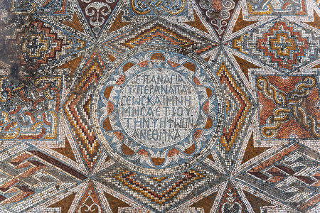 Ancient Byzantine mosaic with Greek inscriptionの写真素材