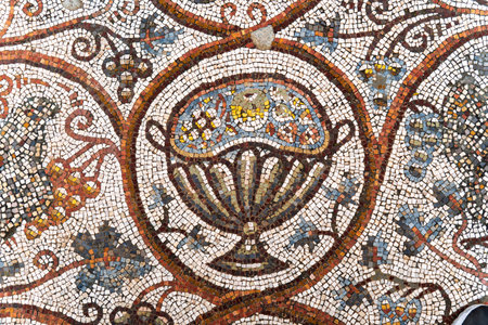 Horvat Beit Loya, Israel - March 29, 2025. Ancient Roman Mosaic with Decorative Fruit Motifの写真素材