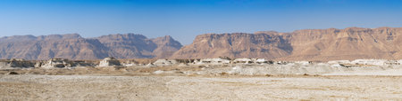 Panorama of Negev Desert with Orange sandstone mountains.の写真素材
