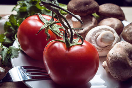 Tomatoes and mushrooms togetherの写真素材