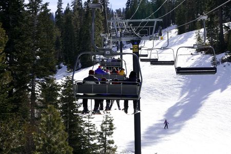 Sunny day in Mountains, skiing liftの写真素材