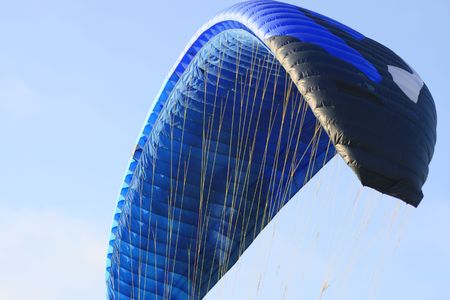 Parachute Flying In the Blue Skyの写真素材