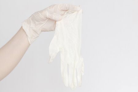 Hand in white glove, protection from the virus, theme of hygiene and protection against coronavirus, covid-19の写真素材