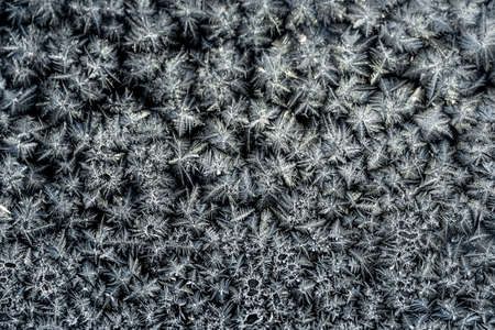 Frost formations on glass in the icy cold winter weatherの写真素材