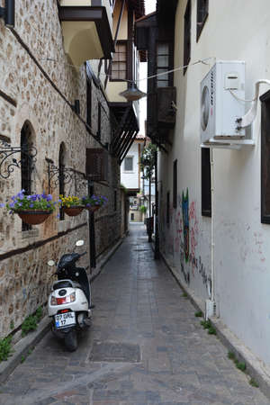 Old narrow street with a mopedのeditorial素材